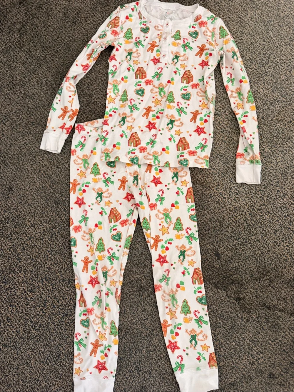 Roller Rabbit White Kids Pajama Set with Green, Red, and Brown Holiday Motifs